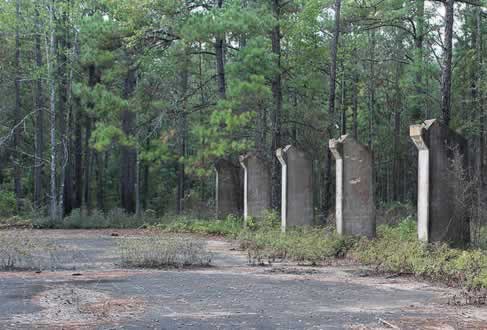 Foundations and concrete support pillars on building ruins at Camp Livingston in Louisiana
