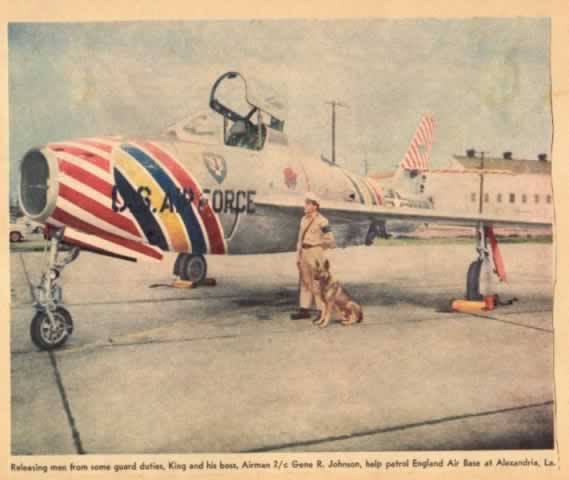 Airmman and his guard dog on patrol over a F-84F Thunderstreak at EAFB