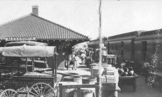 Union Station, Alexandria, Louisiana, circa 1910-15, with horse-drawn wagons meeting the train